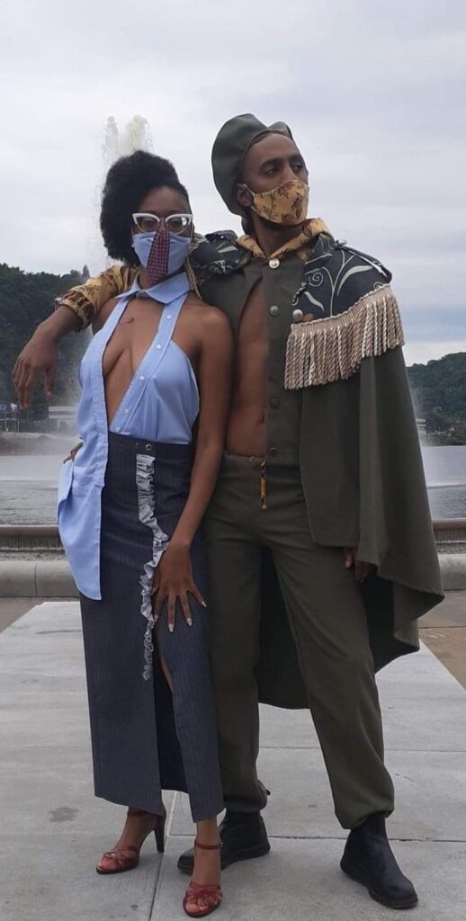 model Delana Flowers wearing an upcylced Bradford Mumpower creation and model Keith Foster wearing a RubyDawn creation